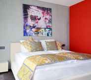 Kamar Tidur 5 Hotel Swiss Star