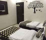 ห้องนอน 4 Spot Inn Hostel