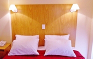 Bedroom 4 Juramento de Lealtad Townhouse Hotel
