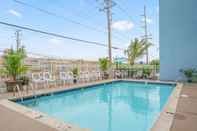 Swimming Pool Coastal Palms Inn & Suites