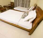 Kamar Tidur 2 Crescent Homes Corporate Stay