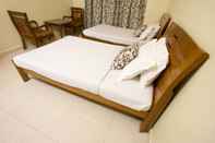 Kamar Tidur Crescent Homes Corporate Stay