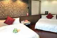 ห้องนอน FuZhuang Hotel