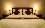 Kamar Tidur 6 Skyline Boutique Hotel