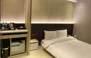 ห้องนอน 6 Jin Man Jia Hotel