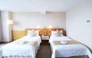 ห้องนอน 6 Yihe Hotel Ouzhuang