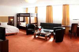 Kamar Tidur 4 Lobinger Hotel - Weisses Ross