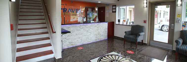 Lobby Travel Inn & Suites