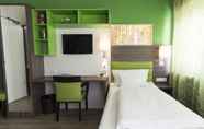 Kamar Tidur 4 BONNOX Boardinghouse & Hotel