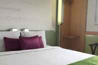 Bedroom Hotel Caspia Pro Greater Noida