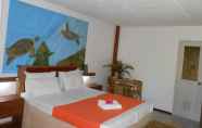 Kamar Tidur 6 Cooper's Beach Resort