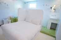 Kamar Tidur The House B&B