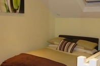 Kamar Tidur Orchard Cottage Bed and Breakfast