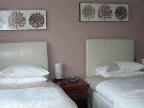 Kamar Tidur 4 Warwick Lodge Guesthouse