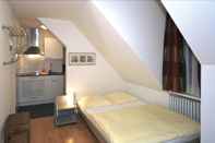 ห้องนอน Apartments Swiss Star Aussersihl