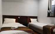 Kamar Tidur 5 Newtown Budget Hotel