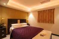 Bilik Tidur Guide Hotel Taoyuan Fuxing