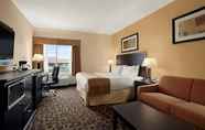 Bedroom 6 Days Inn & Suites by Wyndham Winnipeg Airport Manitoba