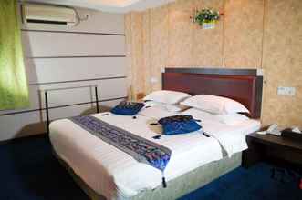 Kamar Tidur 4 Home Club Hotel Shimao Branch