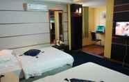 Kamar Tidur 2 Home Club Hotel Shimao Branch