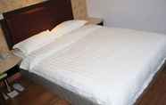 Kamar Tidur 5 Home Club Hotel Yuexiu Branch