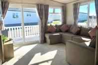 Common Space Bay View 37 Oceans Edge by PRL Lodge Hire