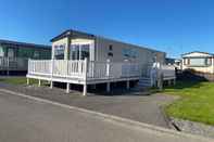 Exterior Bay View 37 Oceans Edge by PRL Lodge Hire