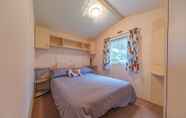 Bedroom 5 Family Caravan at Beautiful Three Lochs Park