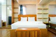 Bedroom Furnished Studio with Comfortable Design Green Pramuka Apartment