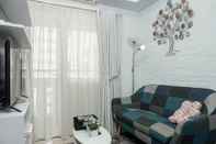 Common Space Relaxing and Warm 2BR @ Green Pramuka City Apartment