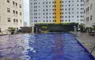 Swimming Pool 7 Minimalist 2BR at Green Pramuka Apartment near Shopping Mall