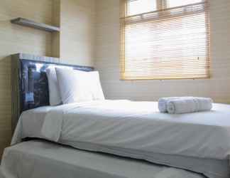 Bedroom 2 Minimalist 2BR at Green Pramuka Apartment near Shopping Mall