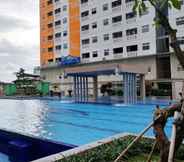 Swimming Pool 2 Chic and Cozy 2BR Apartment at Green Pramuka City