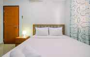 Kamar Tidur 5 Homey and Comfortable 1BR Apartment at Royal Olive Residence