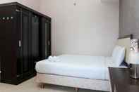 Kamar Tidur Cozy Living 1BR + 1 Apartment at Seasons City