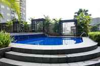 Swimming Pool Minimalist 2BR Apartment at Puri Park View
