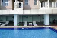 Kolam Renang Functional and Compact 1BR Belmont Apartment