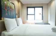 Bedroom 4 Cozy and Modern Studio Apartment at Belmont Residence Puri