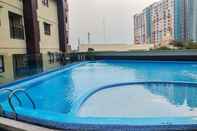 Swimming Pool Minimalist Studio Apartment at Atria Residences with Pool View