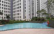 Kolam Renang 5 Minimalist Studio Apartment with City View at M-Town Residence