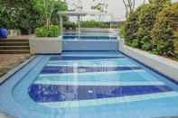 Swimming Pool Cozy Living Studio Apartment at Bassura City