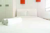 Bedroom Comfy & Clean Studio Apartment at Puri Mas