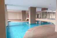 Swimming Pool Minimalist 2BR Apartment at Green Park View