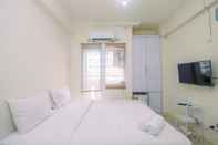 ห้องนอน Cozy Studio with Direct Access to Mall at Green Pramuka Apartment