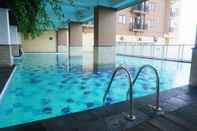 Swimming Pool Homey Studio Room at Tamansari Panoramic Apartment