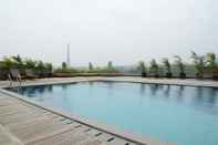 Swimming Pool Clean and Tidy Studio Room at Tree Park Apartment