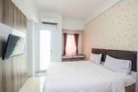 Kamar Tidur Minimalist Tamansari Mahogany Studio Apartment with City View