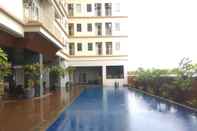 Kolam Renang Modern Studio with City View at Tamansari Mahogany Apartment