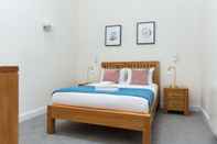 Bilik Tidur Queens Park by Flying Butler Apartments