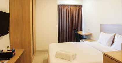 Bedroom 4 Comfy and Homey Studio Apartment @ Grand Kamala Lagoon